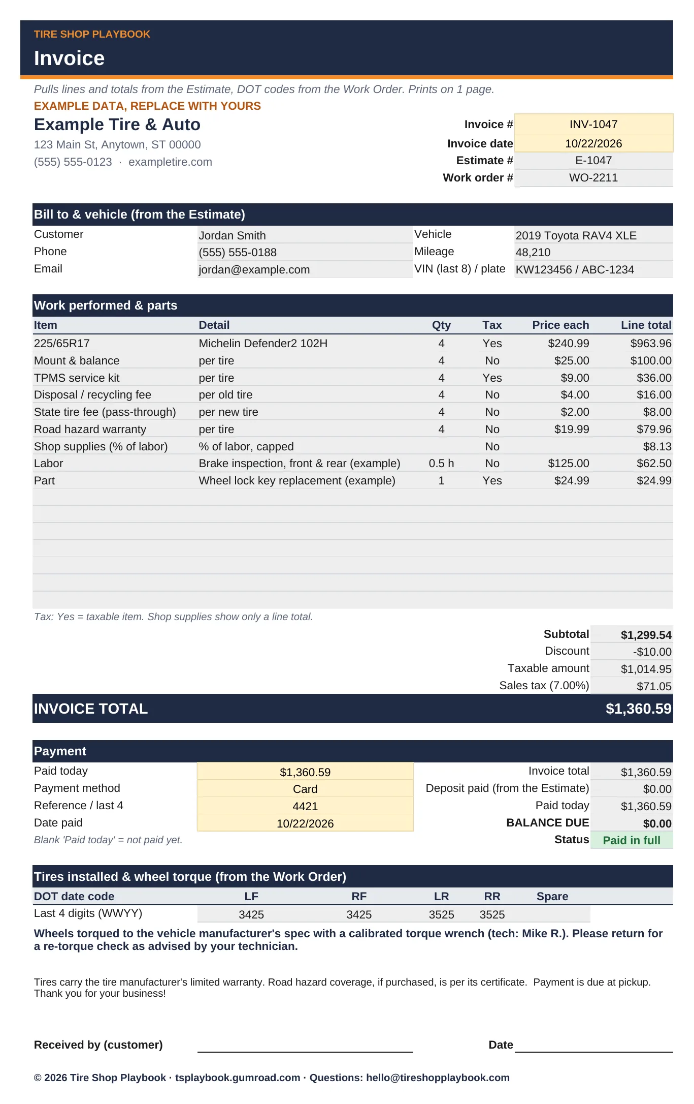 Invoice with example data, paid in full.